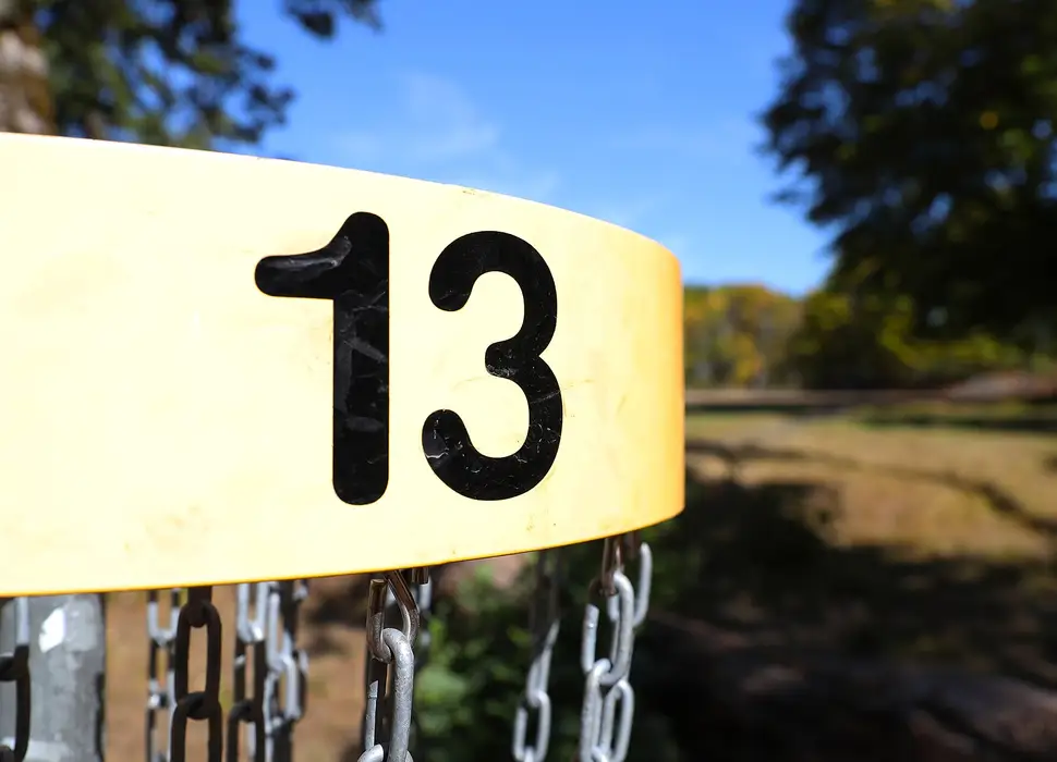 Close-up of the number band and chains on basket 13